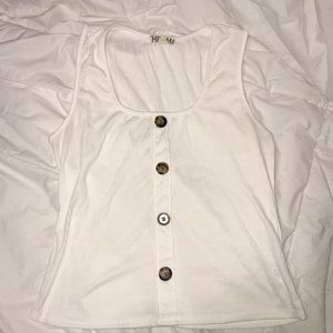 White top with brown buttons